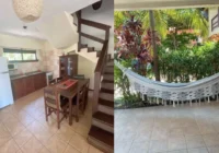 Cozinha com sala de jantar e varanda com rede — casa