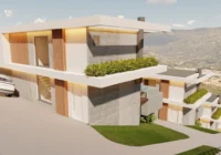 Fachada moderna de casas em declive com vista panorâmica