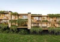 Fachada moderna do prédio com vegetação pendente — apartamento à venda Praia da Gamboa Garopaba