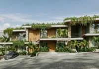 Fachada do prédio moderno com paisagismo — apartamento à venda Praia da Gamboa Garopaba